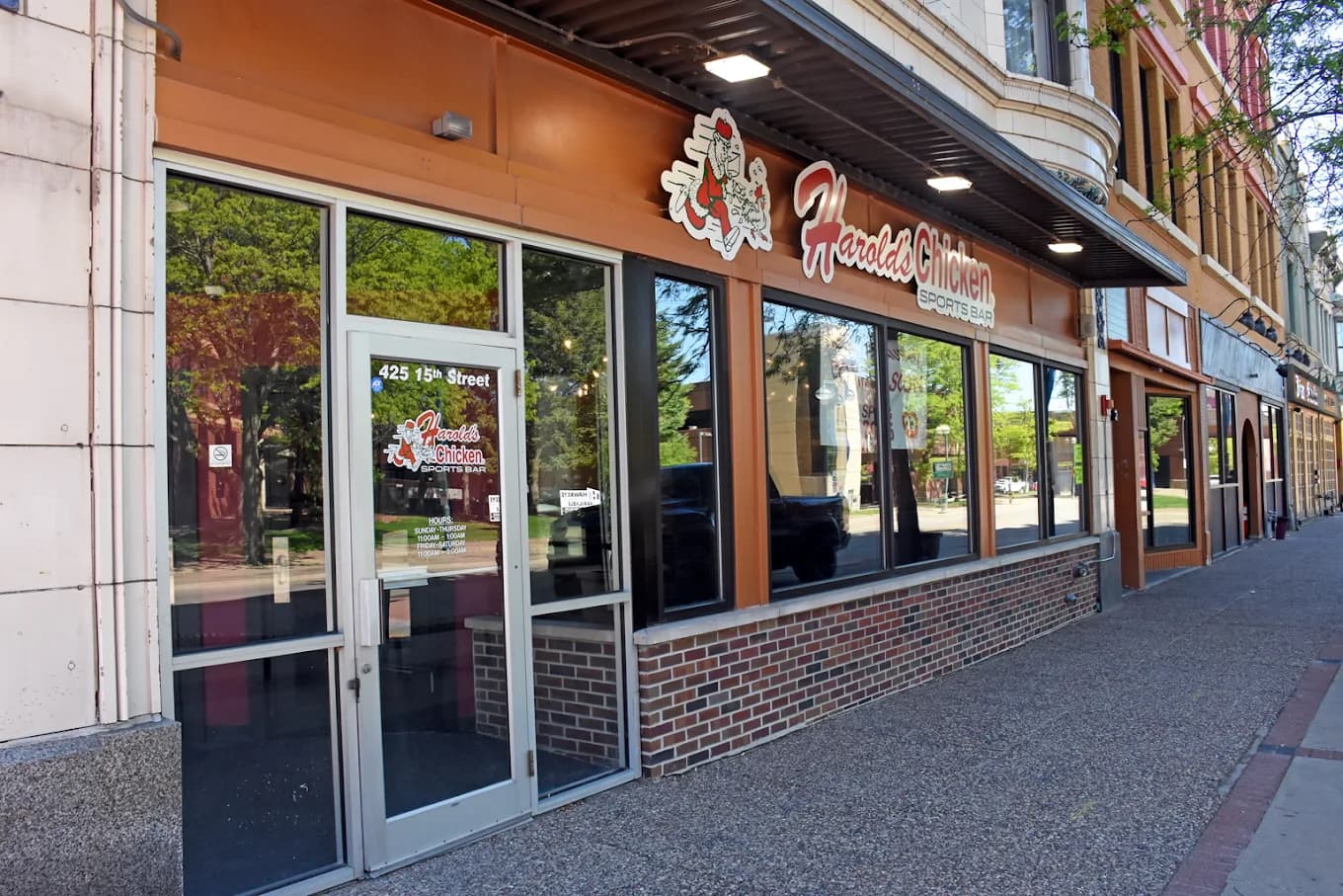 Customers enjoying Harold's Chicken